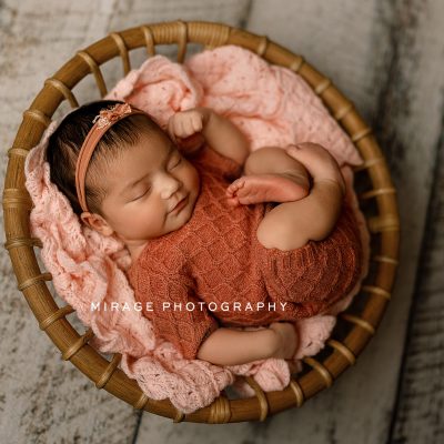 Newborn girl in basket