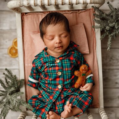 Studio photoshoot with baby on Christmas set up