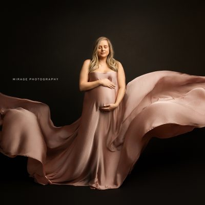 fabric on pregnant woman in studio