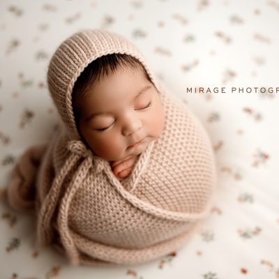 Newborn Girl in Blush Knit Wrap | Mirage Photography Fowlerville, MI