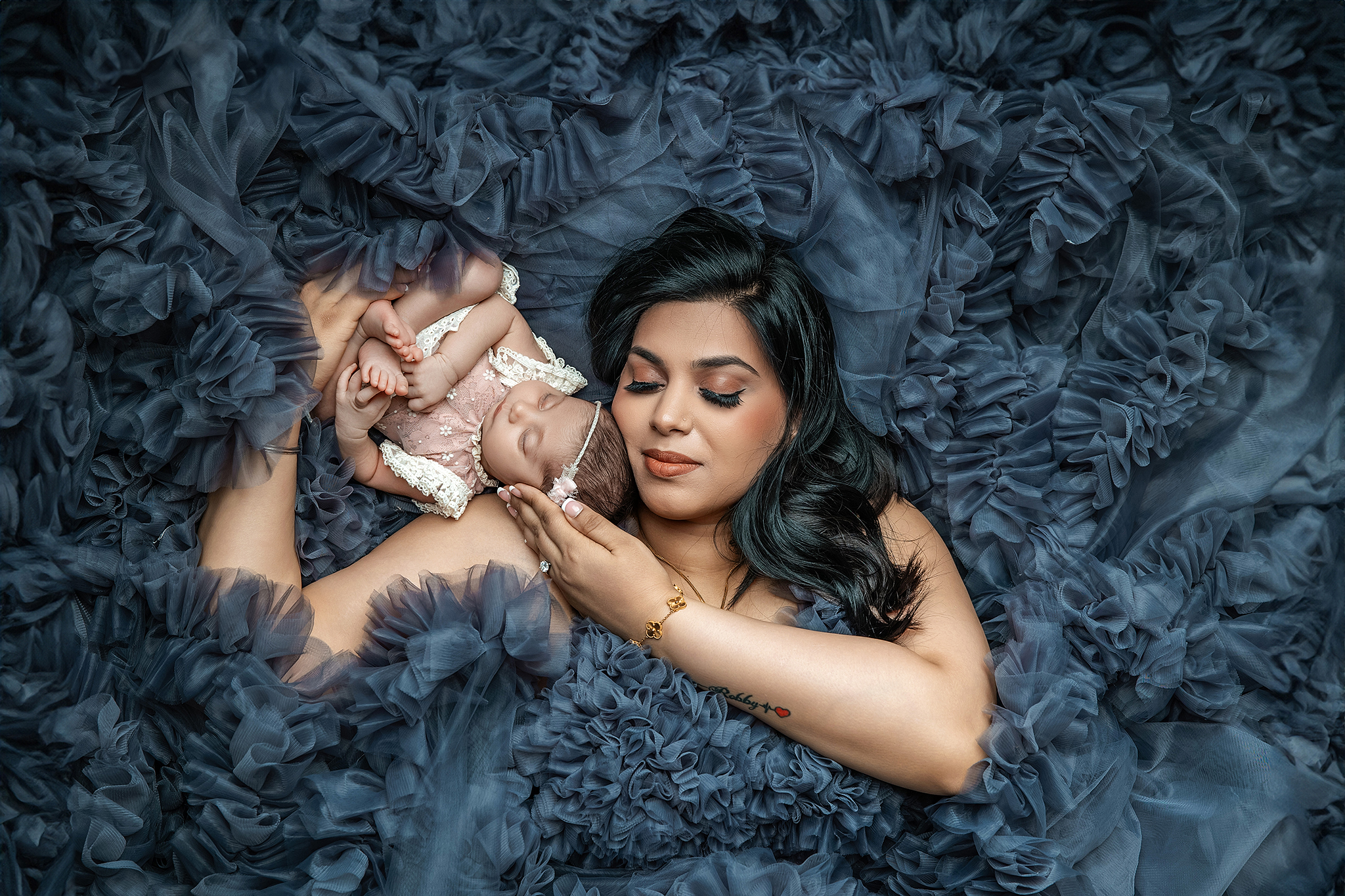 Wrapped newborn pose modern studio newborn photography Michigan