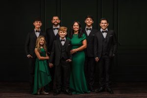 family in green in fowlerville