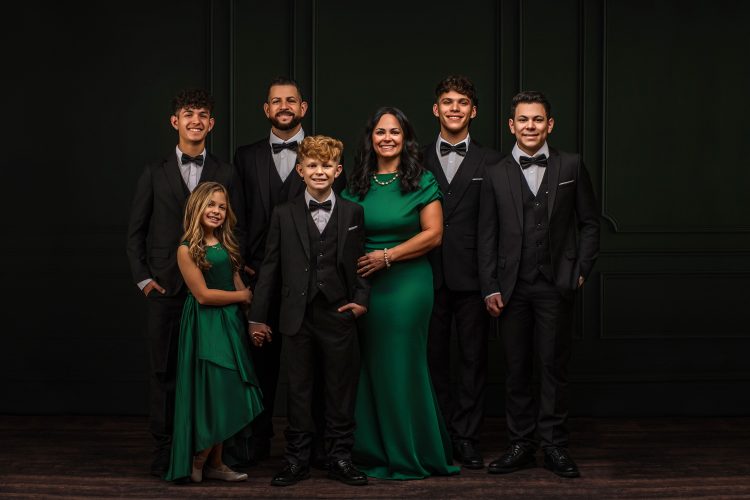 family in green in fowlerville