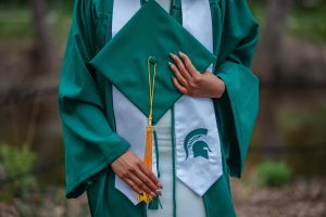 msu student close up of cap and gown